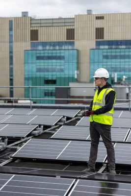 solar array and construction worker